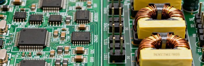 Hybrid PCB: SMT microchips (low-power) and THT connectors (high-power) integrated