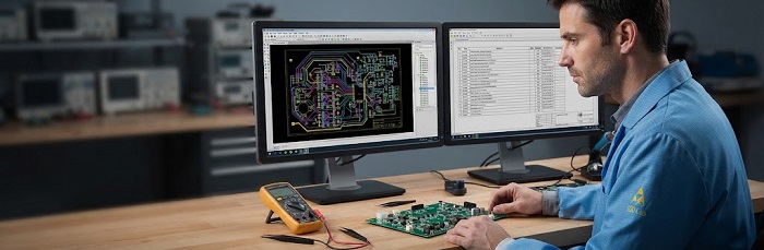 Engineer reviewing PCB layout and files