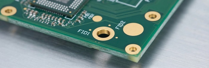 PCB fiducial marks and process border rails